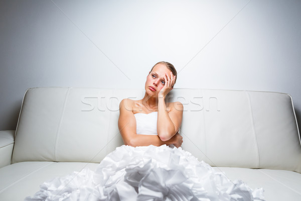 Sad bride crying sitting on a sofa Stock photo © lightpoet