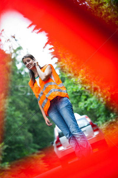 Young female driver  calling the roadside service Stock photo © lightpoet