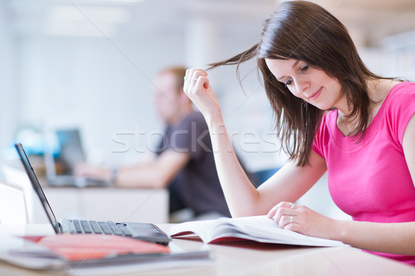 [[stock_photo]]: Bibliothèque · joli · Homme · étudiant · portable · livres