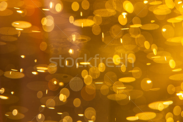 Golden macro background: gas bubbles in beer  Stock photo © lightpoet