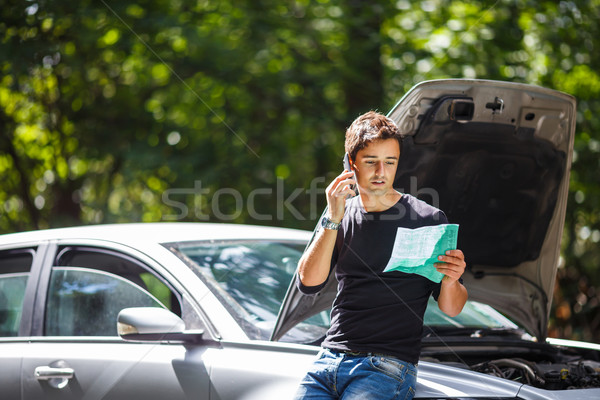 Gut aussehend junger Mann fordern Hilfe Auto defekt Stock foto © lightpoet