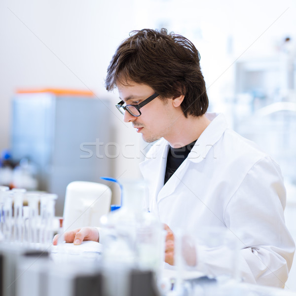 Fiatal férfi kémia diák labor hordoz Stock fotó © lightpoet
