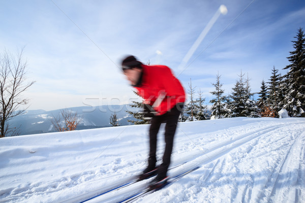 Cross-country skiing: young man cross-country skiing  Stock photo © lightpoet