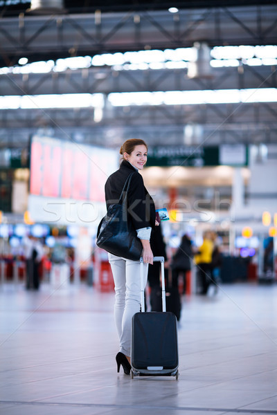 Pretty young female passenger at the airport  Stock photo © lightpoet
