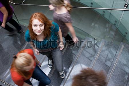 Diákok felfelé lefelé elfoglalt lépcsőfeljáró csinos Stock fotó © lightpoet