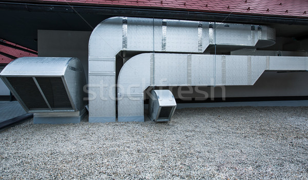 Air conditioning equipment atop a modern building  Stock photo © lightpoet