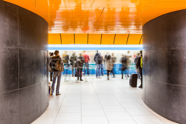 Stock photo: People rushing through a subway corridor 