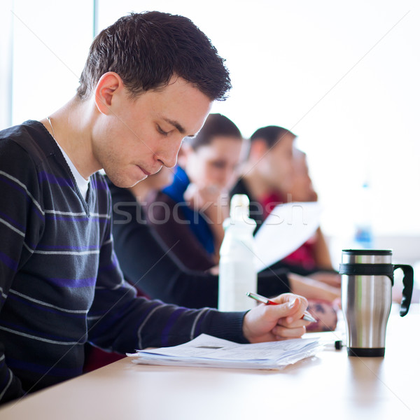 年輕 英俊 男 大學生 坐在 課堂 商業照片 © lightpoet