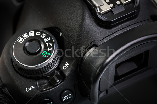 Professional modern DSLR camera - detail of the top LCD with set Stock photo © lightpoet