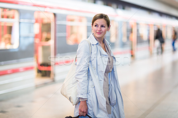 Elegant, smart, young woman taking the metro/subway Stock photo © lightpoet