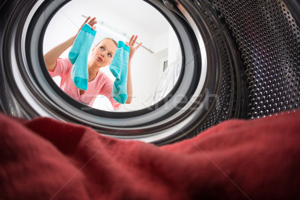 Jeune femme buanderie vue machine à laver heureux travaux [[stock_photo]] © lightpoet