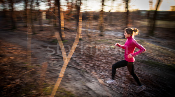 Young woman running outdoors in a city park  Stock photo © lightpoet
