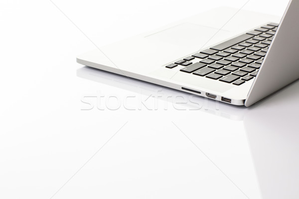Modern laptop computer on white Stock photo © lightpoet
