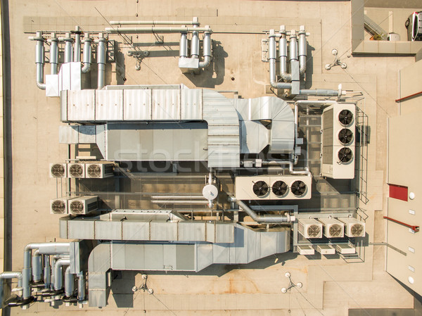 Stock photo: Air conditioning equipment atop a modern building - aerial/drone