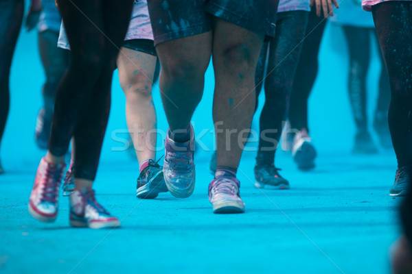 People participating in the Color Run - Runners' legs amid blue  Stock photo © lightpoet