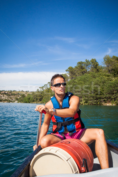 Frumos tânăr canoe lac vară Imagine de stoc © lightpoet