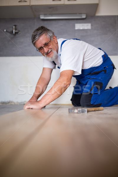 Férfi padló parketta csináld magad javítás épület Stock fotó © lightpoet