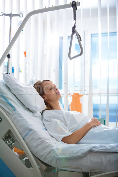 Pretty, young, female patient in a modern hospital room Stock photo © lightpoet