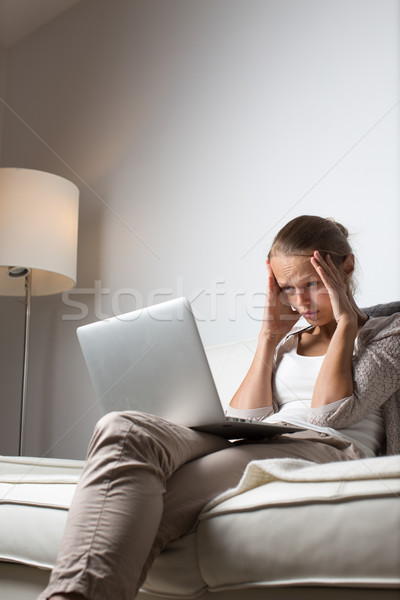 Stock photo: Pretty, young woman calling on her call phone