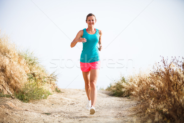 若い女性 ジョグ 幸せ 森林 海 ストックフォト © lightpoet