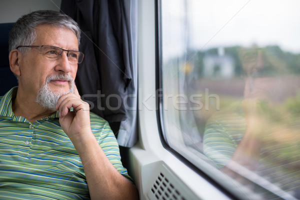 Senior Mann genießen Zug Reise Auto Stock foto © lightpoet