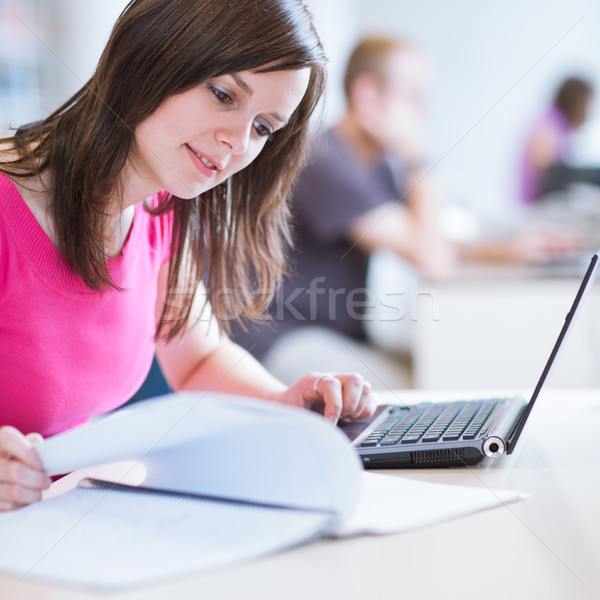 Könyvtár csinos női diák laptop könyvek Stock fotó © lightpoet