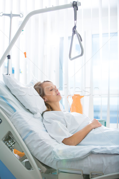 Pretty, young, female patient in a modern hospital room Stock photo © lightpoet