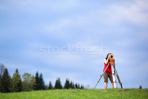 Young land surveyor at work
 Stock photo © lightpoet