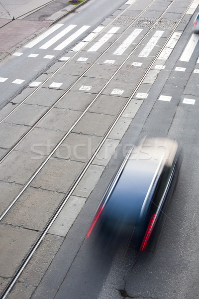 urban traffic concept - city street with a crossing, rail, motio Stock photo © lightpoet