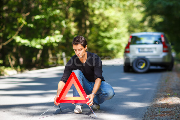 Gut aussehend junger Mann Auto defekt nach unten Straßenrand Stock foto © lightpoet