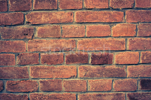Weathered red brick wall background with vignette eccet Stock photo © lightpoet
