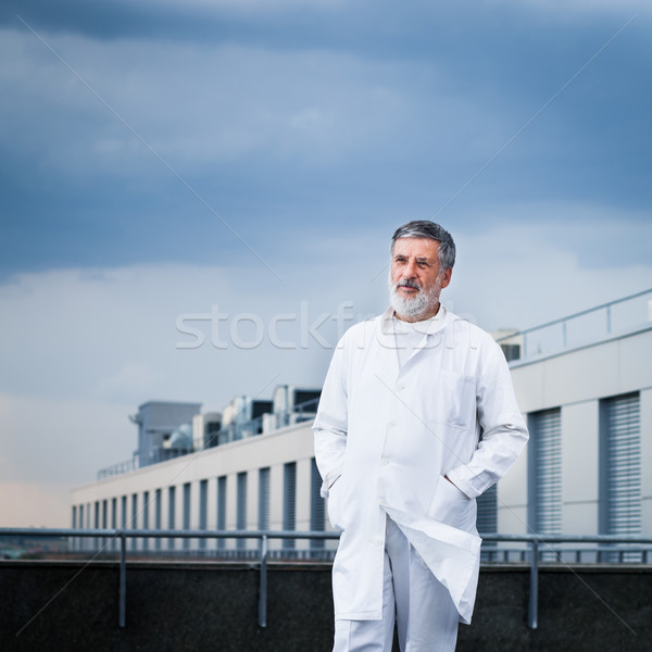 Renowned scientist/doctor standing on the roof  Stock photo © lightpoet