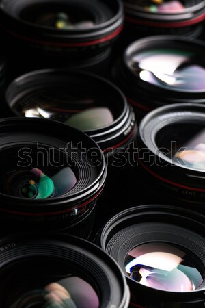 Modern camera lenses with reflections, low key image Stock photo © lightpoet