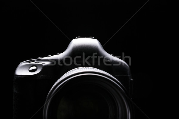 Professional modern DSLR camera low key image Stock photo © lightpoet