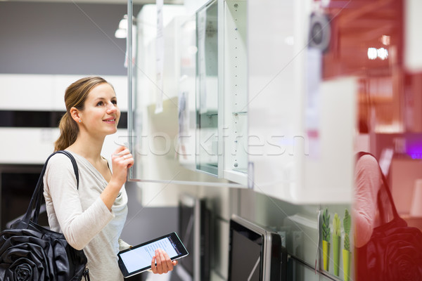 年輕女子 購物 家具 存儲 計算機 商業照片 © lightpoet