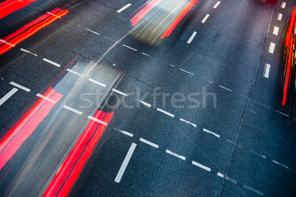 Motion blurred city road traffic (color toned  image) Stock photo © lightpoet