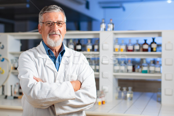 Senior chemistry professor/doctor in a lab  Stock photo © lightpoet