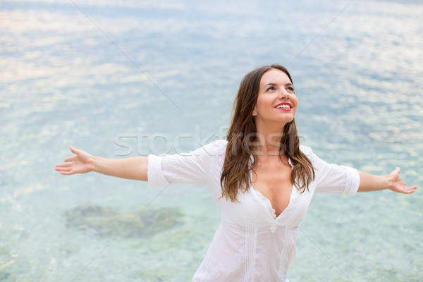 Foto stock: Mulher · relaxante · praia · brasão · abrir