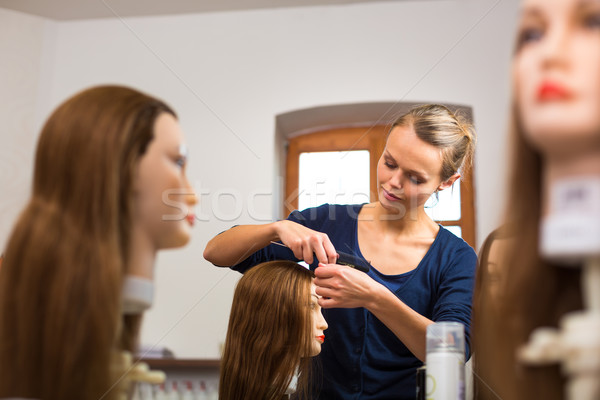 Pretty female hairdresser/haidressing apprentice/student Stock photo © lightpoet