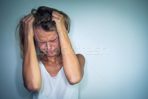 Jeune femme souffrance dépression anxiété peur éclairage Photo stock © lightpoet