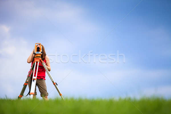Young land surveyor at work Stock photo © lightpoet