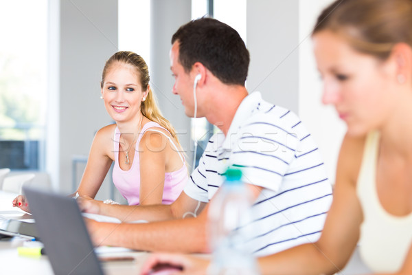 In the library - group of college/university students, friends,  Stock photo © lightpoet