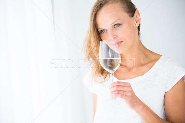 Gorgeous young woman with a glass of wine,  Stock photo © lightpoet
