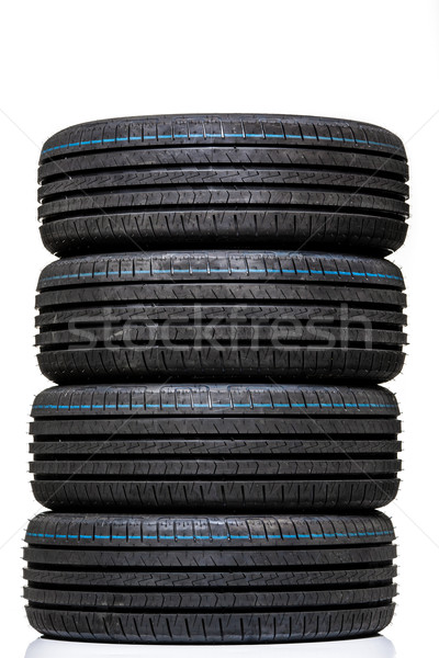 Stack of brand new high performance car tires on clean high-key  Stock photo © lightpoet