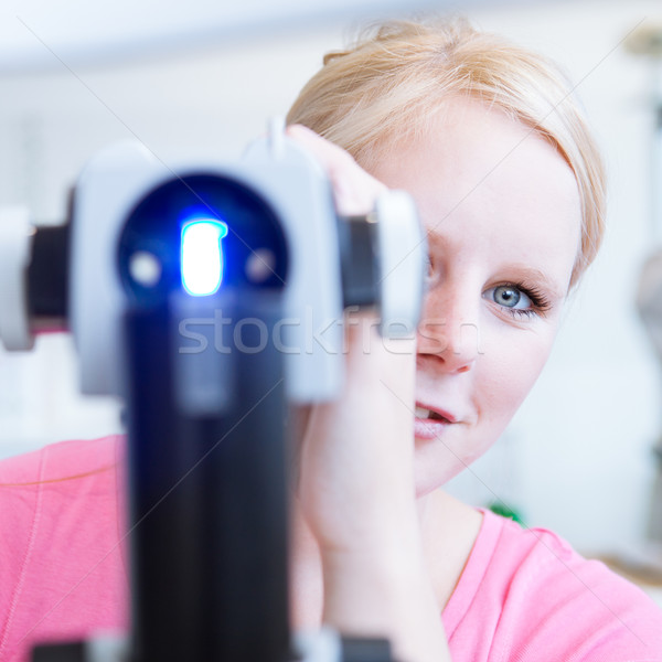 Retrato jóvenes bastante optometrista lámpara color Foto stock © lightpoet