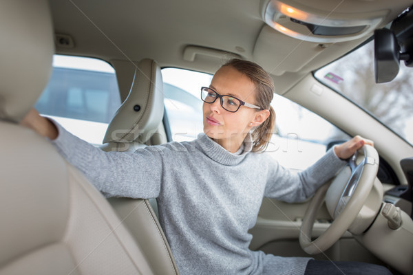 Woman driving a car - female driver at a wheel of a modern car  Stock photo © lightpoet