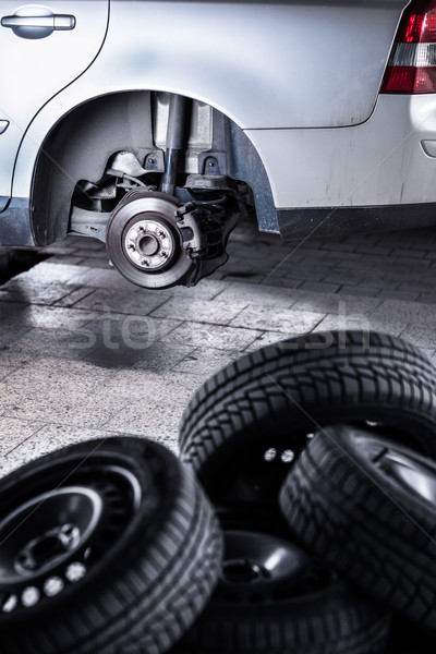 inside a garage - changing wheels/tires  Stock photo © lightpoet