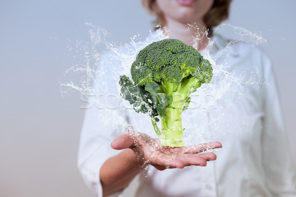 Woman Hand Broccoli Water Splashes Stock photo © limbi007