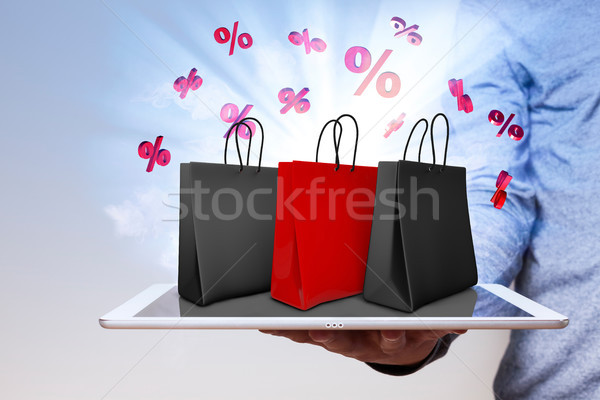 Man Tablet Shopping Bags Red Percents Stock photo © limbi007