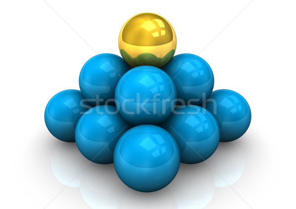 Piramis kék golyók egy arany labda Stock fotó © limbi007